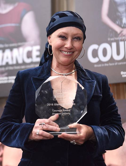 Shannen being awarded with courage award