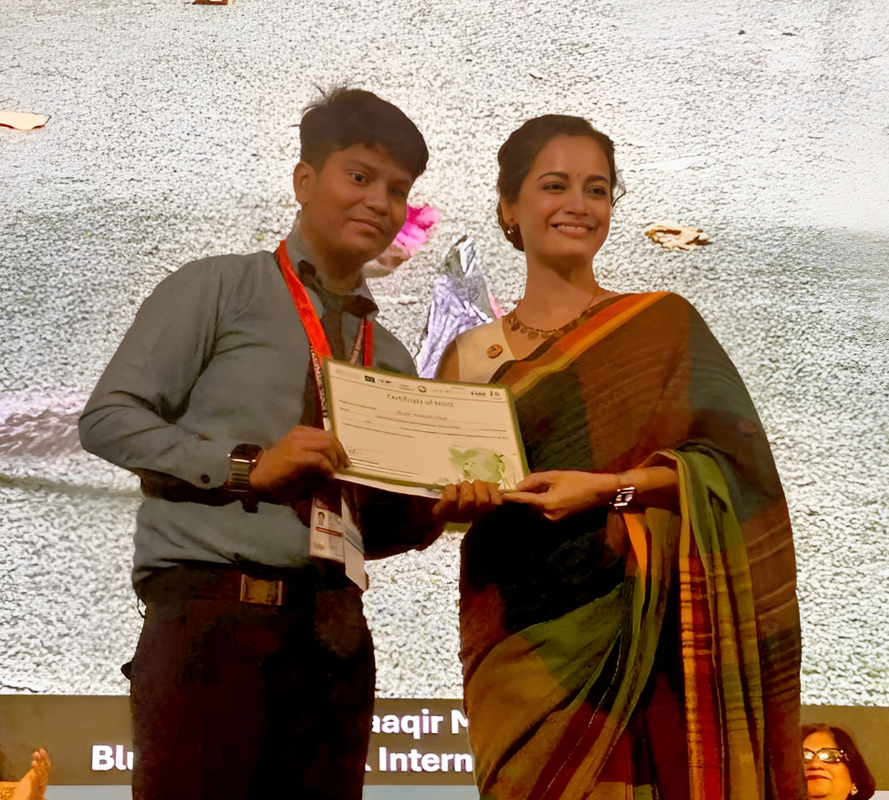 Student receiving an award certificate