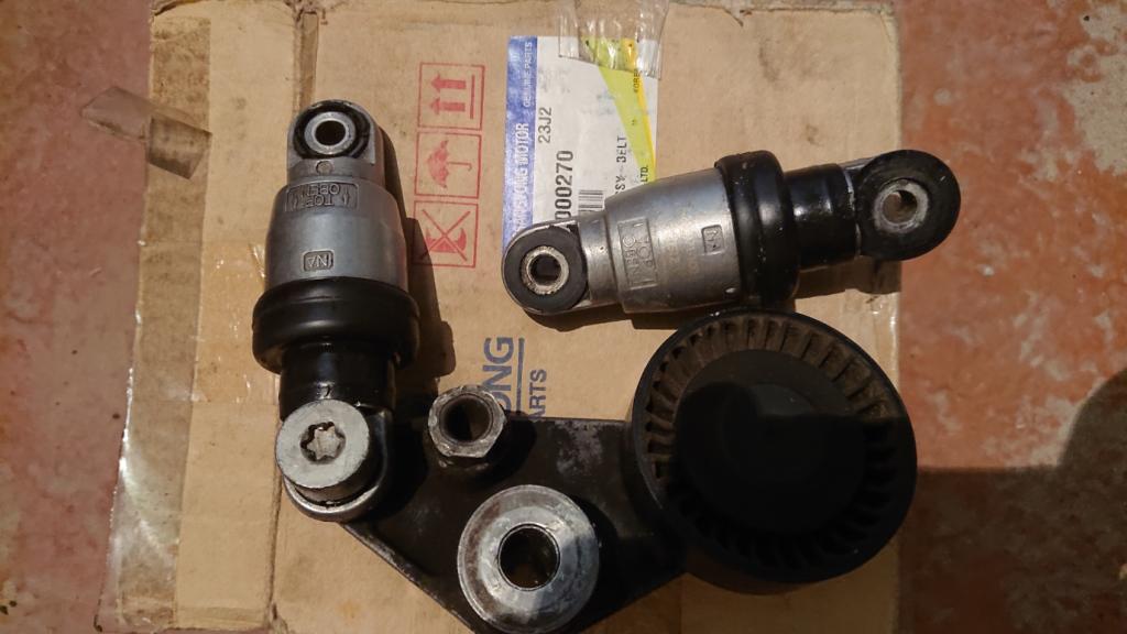 натяжитель ремня генератора