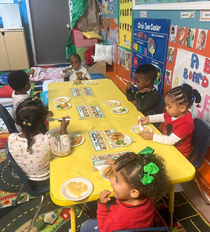 Mealtime together at 1st Step Learning Academy