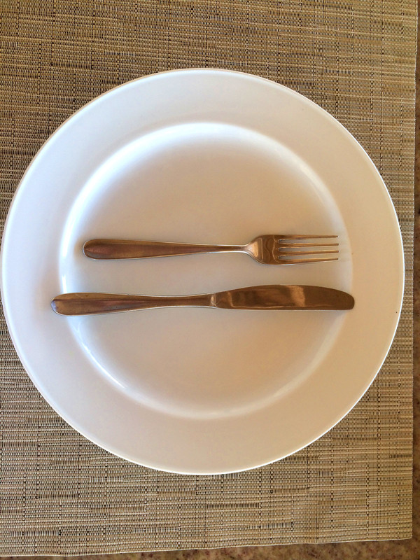 Pribor na tanjiru kaže "Obrok je bio odličan"