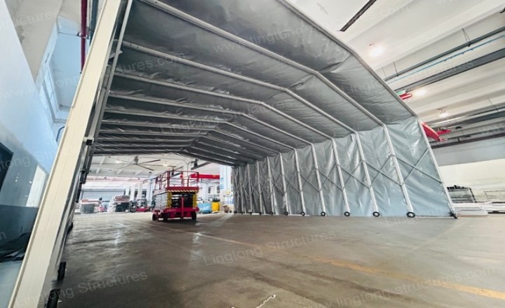 Retractable tent used as car wash station awning