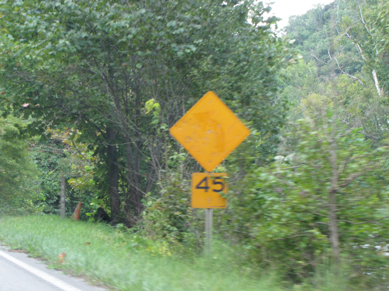 faded curve sign
