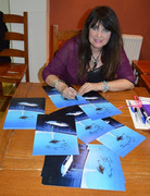 Caroline-Signing-LOW-RES.jpg