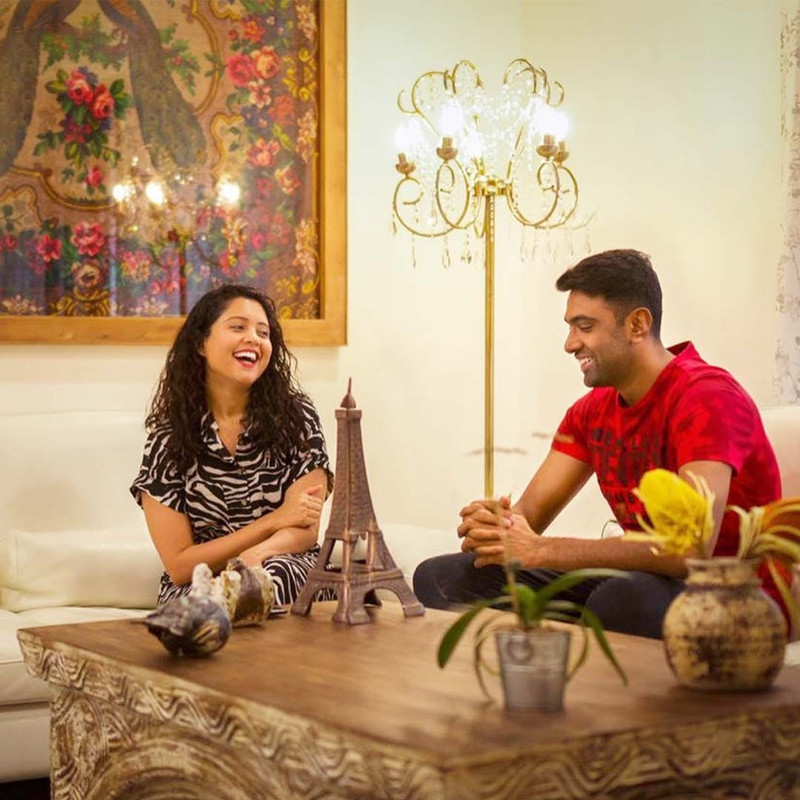 Ashwin and his wife in their house