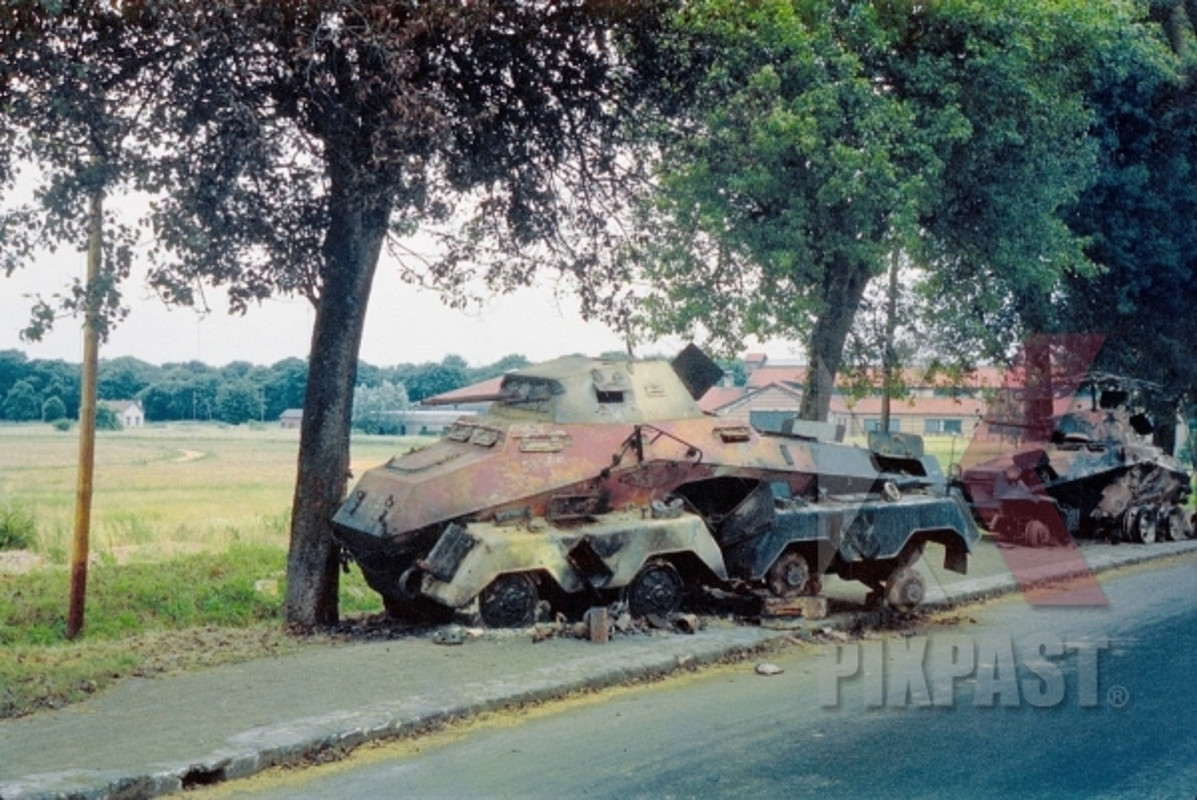 BURNED OUT GERMAN PANZERSPAHWAGEN (SD KFZ 232) 8-RAD AND PANZERS