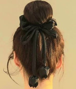 Tulip scrunchie styled on bun
