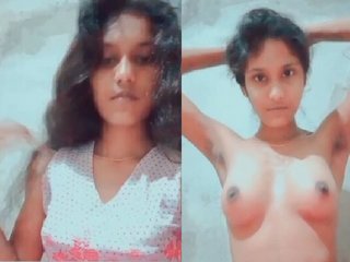 Adorable girl in a popular Sri Lankan sex video, topless