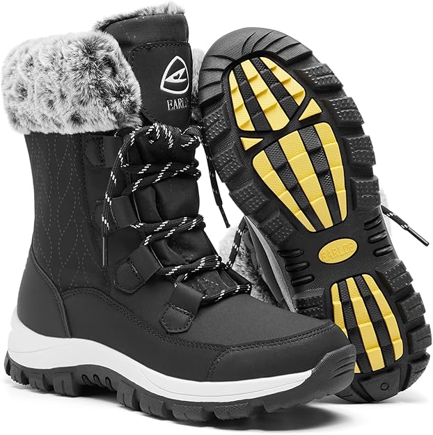 Black snow boots with fur lining and traction sole