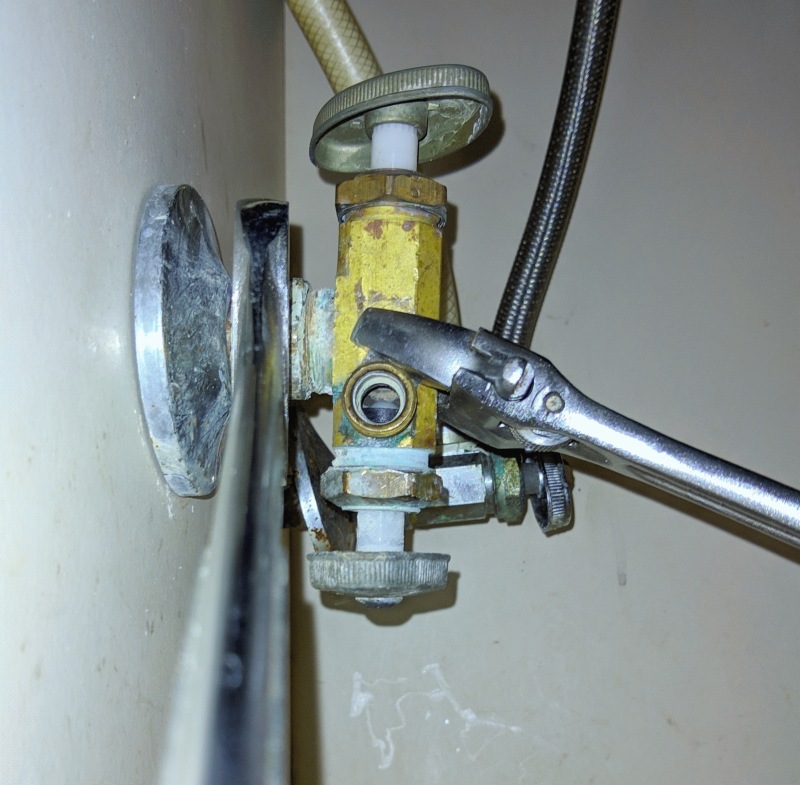 How to remove stubborn 1/2 inch compression ring holding undersink