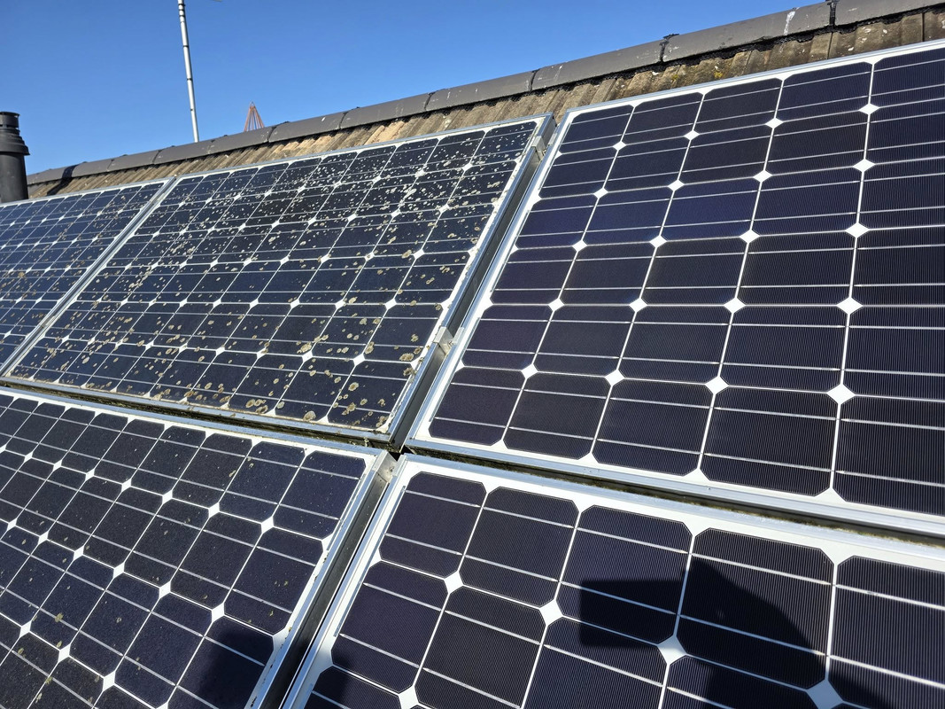 Solar panels being cleaned