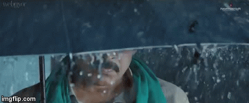 pawan-kalyan-rain-umbrella-varsham-godugu.gif