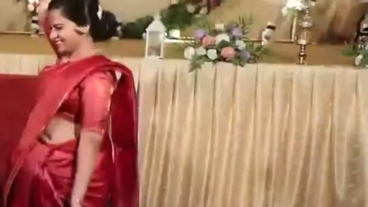 Cute Malayali bride wide open deep anvel in red saree.mp4_snapshot_01.20.239
