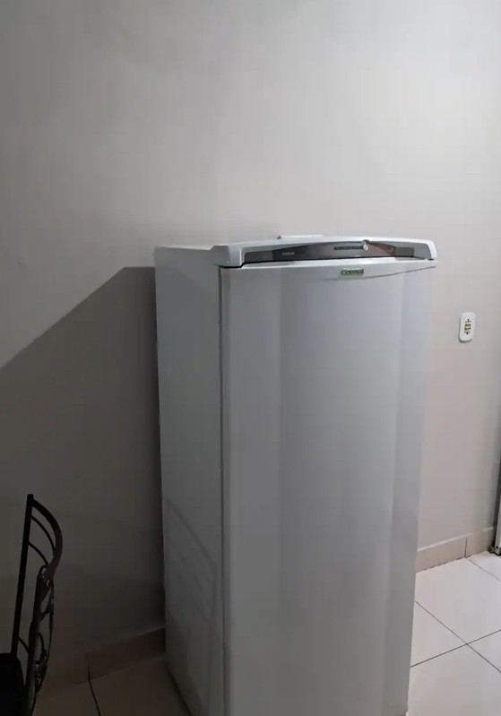 Máquina de lavar roupas na kitnet