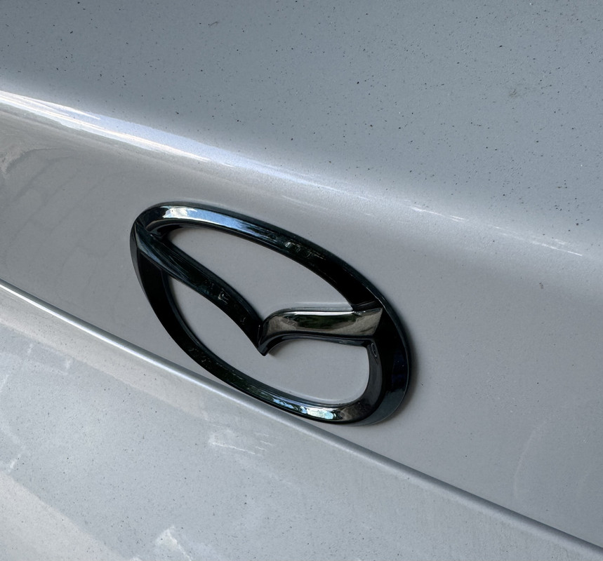 OEM Mazda MX-5 Miata Rear Chrome Emblem – Red Lettering, 1990-1997, Genuine NA01-51-721A