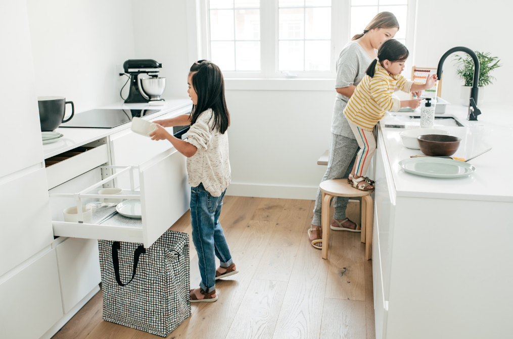 family leaning home together
