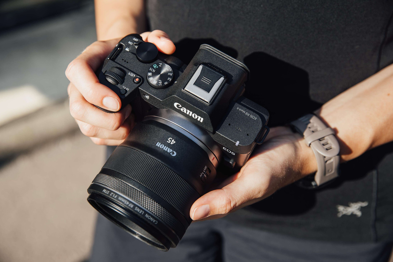 Canon EOS R8 Mark II held ready to shoot outdoors
