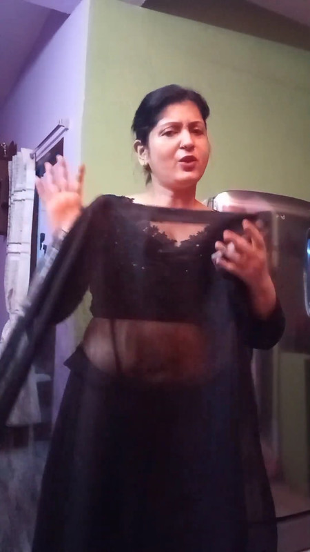 Chubby Beautiful Benali aunty saree drape in black saree.mp4_snapshot_00.03.493