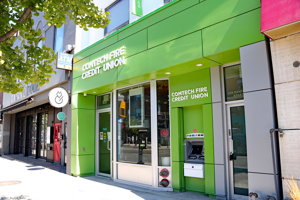 Interior of a modern bank or credit union branch.