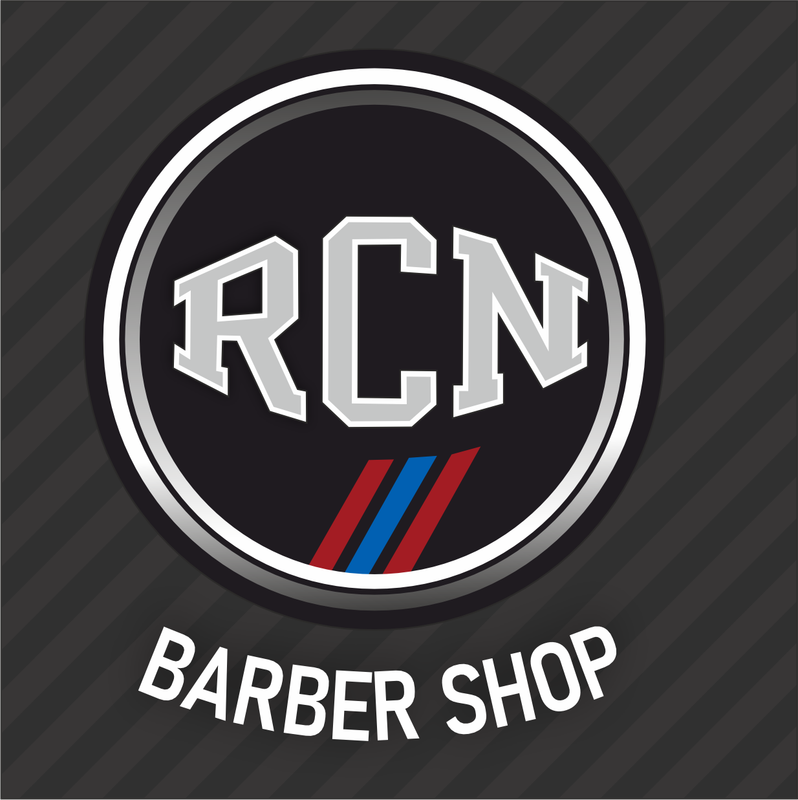 A stylish barbershop interior with vintage chairs and a clean aesthetic.