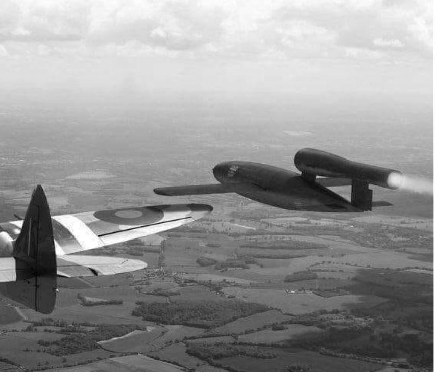 An-RAF-Spitfire-about-to-tip-a-V1-flying