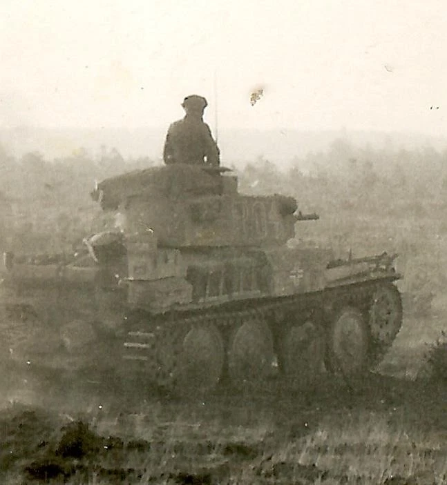 BEST German Pzkw 38(t) Panzer Tank Column Passing Stopped Tanks in Field (1)