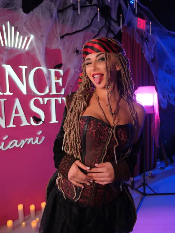 A guest in a pirate costume, winking