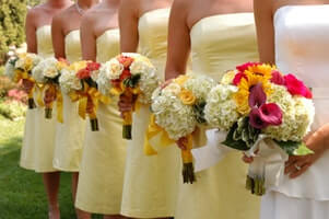 bridal party holding bouquets