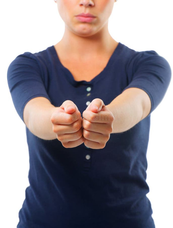i-surrender-studio-shot-young-woman-holding-out-her-arms-ready-to-be-handcuffed-i-surrender-studio-s.jpg