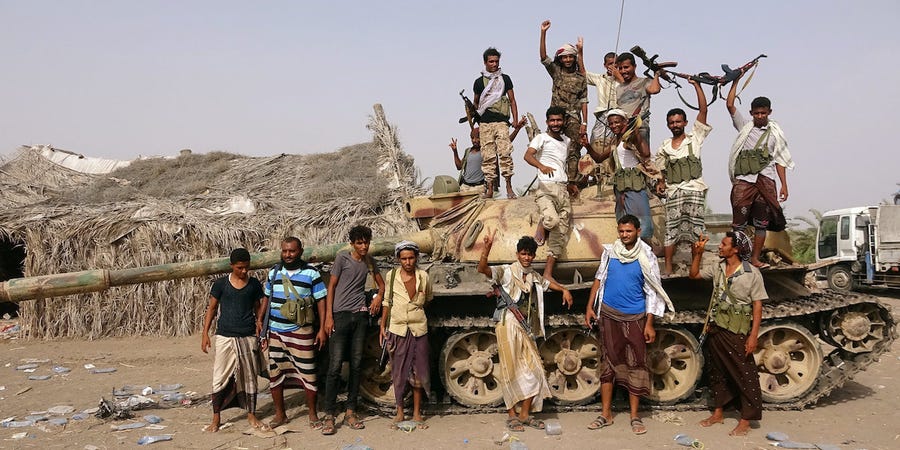 tribal-fighters-loyal-to-yemeni-governement-with-tank-at-al.jpg