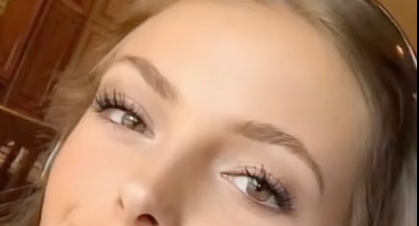 One Sexy Babe Posing Seductively And Flaunting Herself.