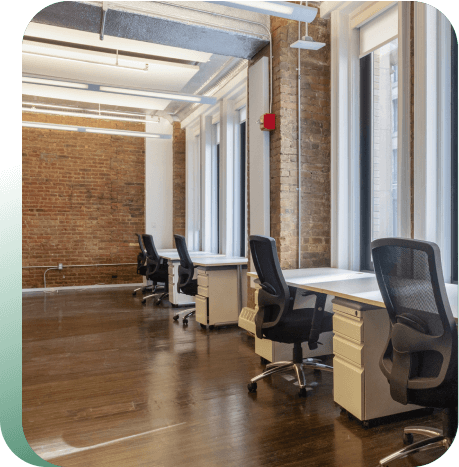 Multiple desks and office amentities in small private office