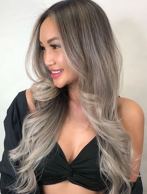 Long ash blonde ombre hair asian woman