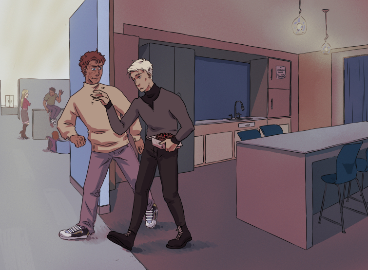 Neil and Andrew chatting in a kitchen.