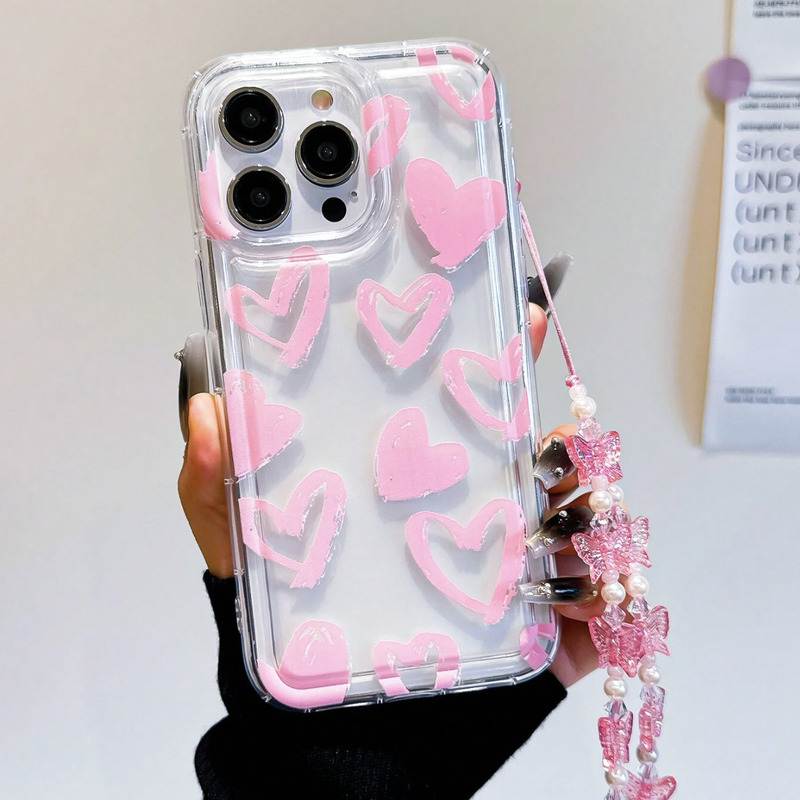 Foto de Funda transparente con diseño corazón. Incluye correa de mano.