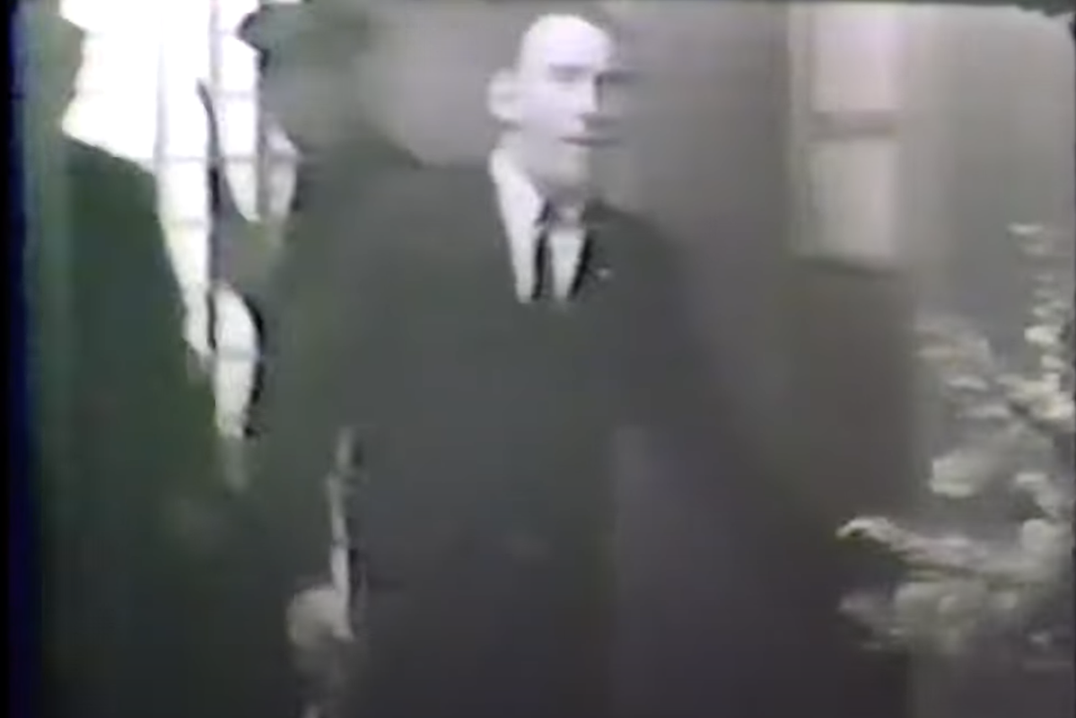 Kent Biffle arrives on 2nd floor TSBD as filmed by Tom Alyea