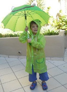 cute-boy-in-his-4akid-green-frog-raincoat