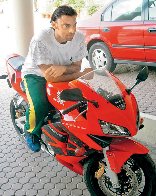 Akhtar with his bike Honda CBR