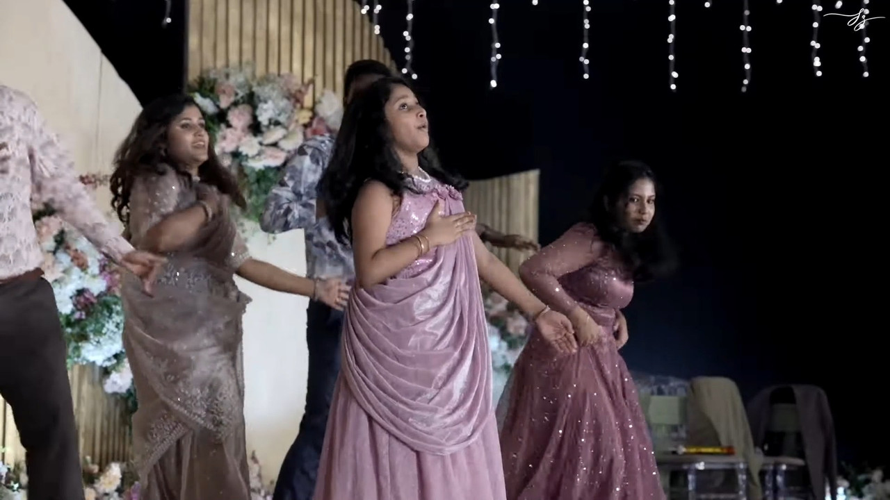 busty malayali girl jiggling boobs and navel slips in marroon costume.mp4_snapshot_00.21.220