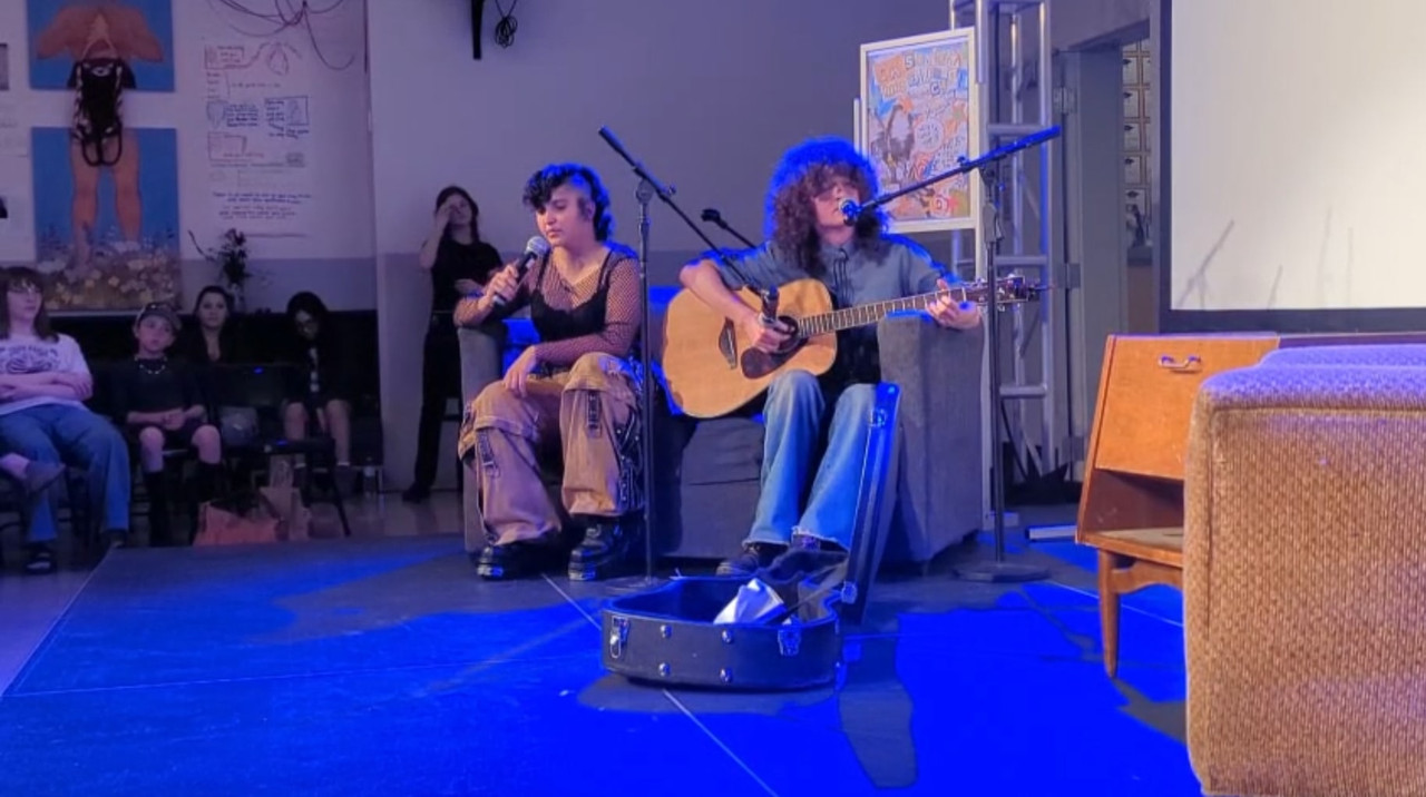 Photo of me singing a duet on stage