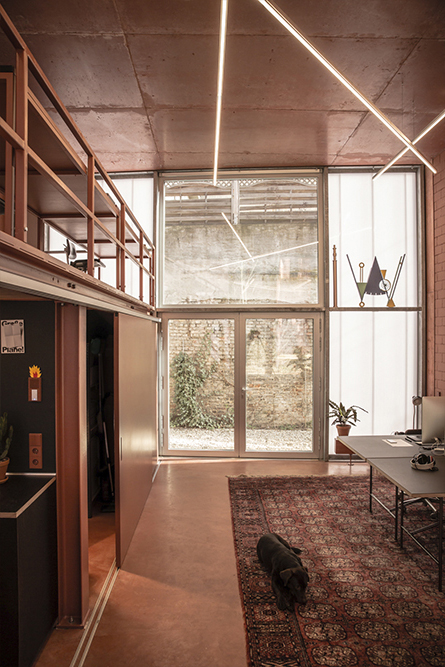 Linear lighting structures within the open volume of Am Lokdepot Berlin