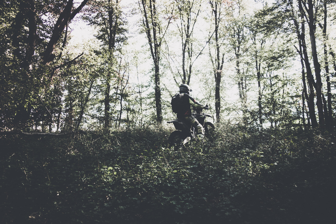 Enduro riding through the forest