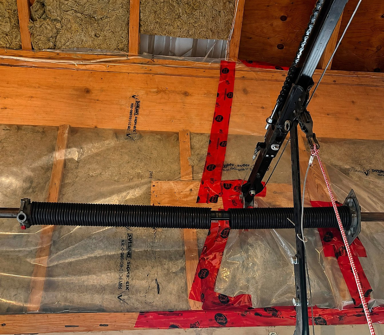 Garage door torsion spring system inspected during service in Richmond Hill