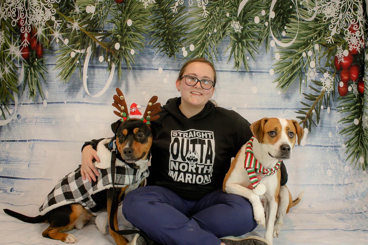 Kiana with her dogs, Daisy and Rosey.