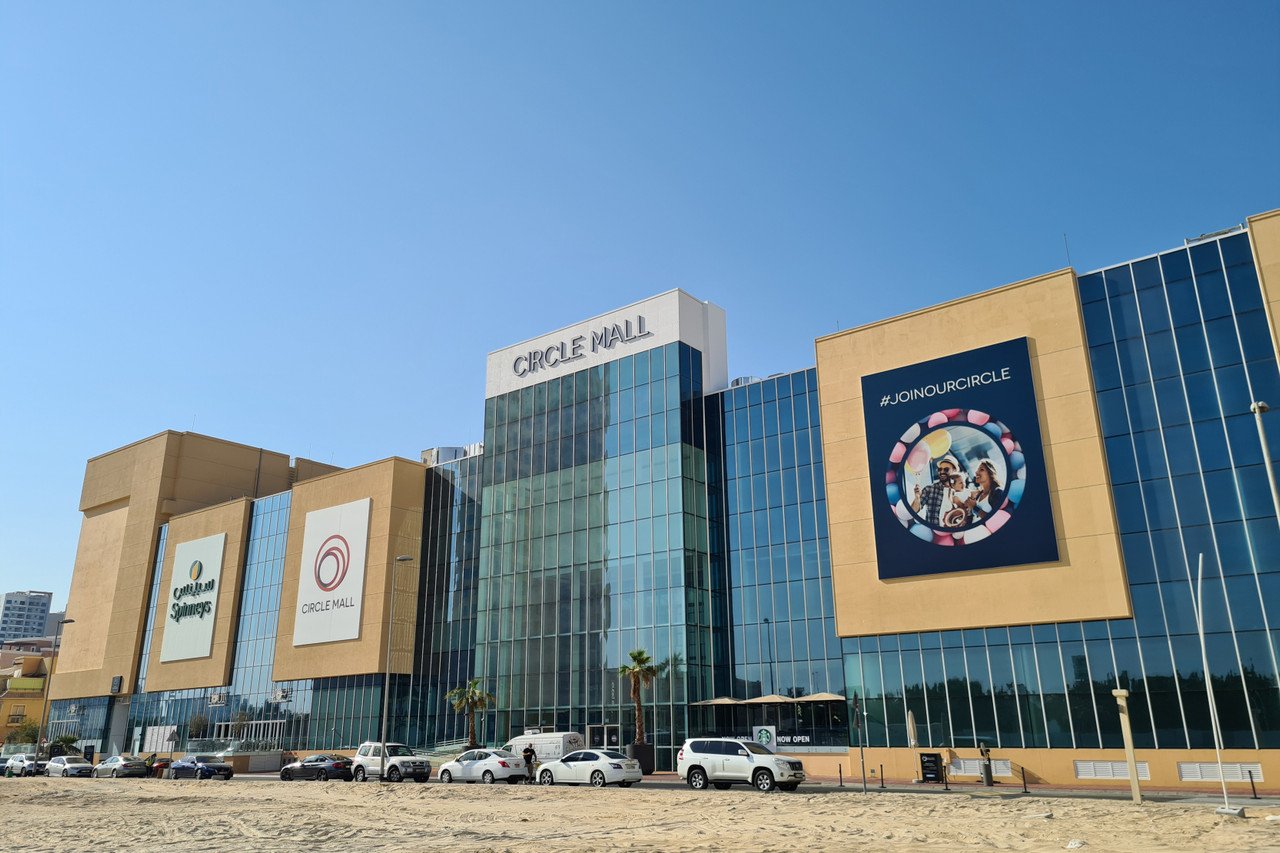 An image of the outside of JVC Circle Mall from outside in District 11