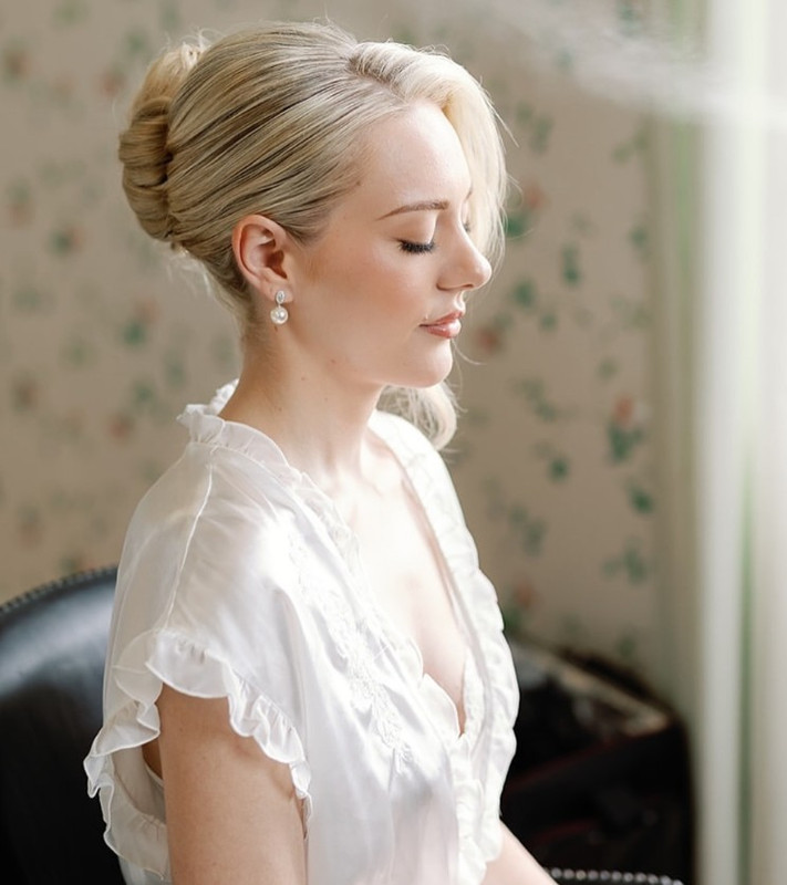 Classic bridal makeup with elegant updo