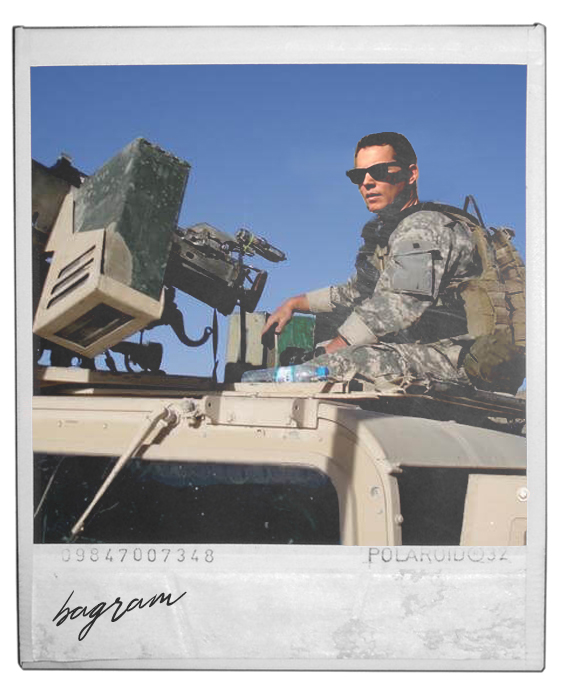 A polaroid photo of Jack in Afghanistan on top of a vehicle