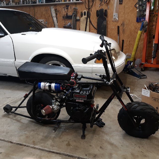 Spring loaded wheelie bar ideas for drag bike?