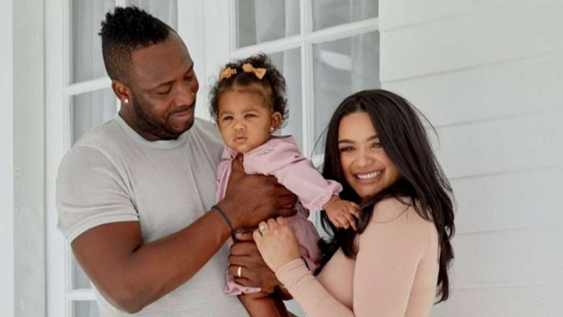 Andre with his wife and daughter