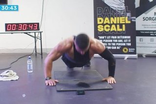 Athlete-does-3249-pushups-in-hour-to-break-world-record.jpg